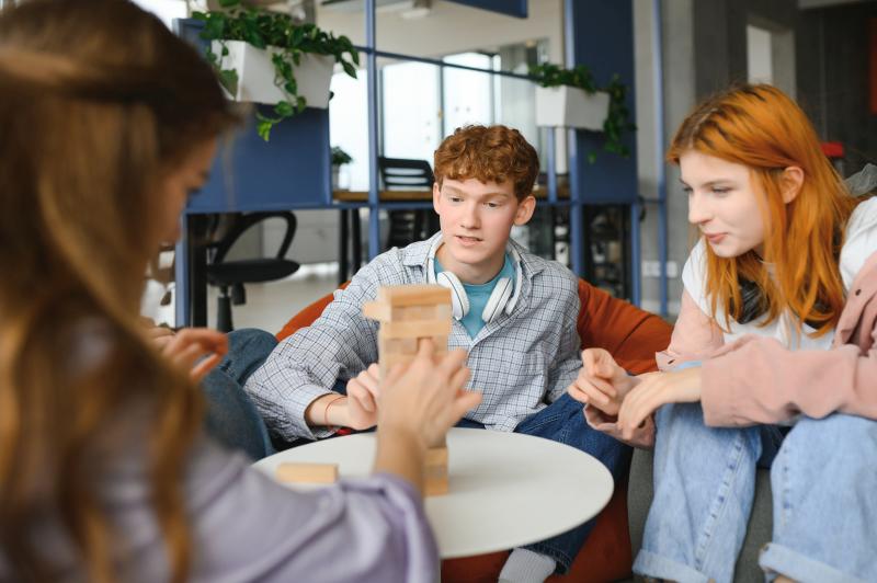 Children playing with colorful plasticine